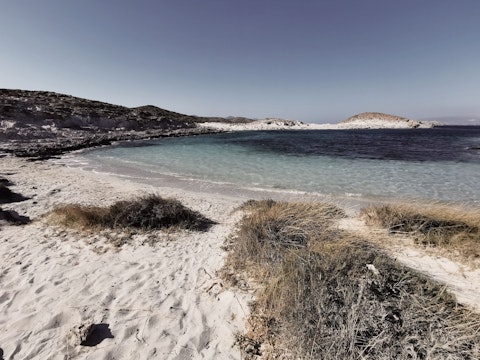 Enjoy an afternoon on Agia Irini Beach, a twelve-minute drive away
