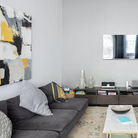 Sink into the soft suede sofa after a day wondering Manhattan