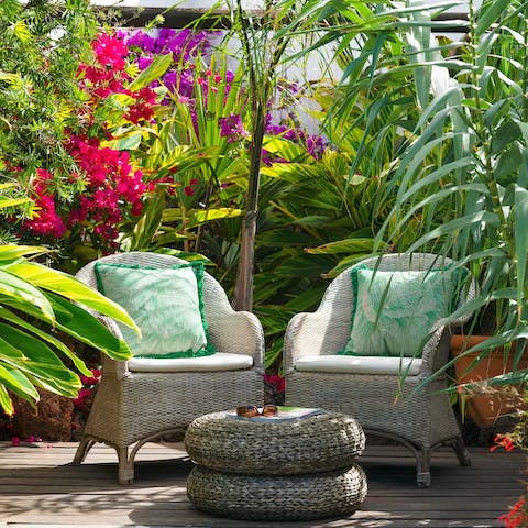 Open a bottle of local wine, get cosy on the rattan chairs and watch the sun go down