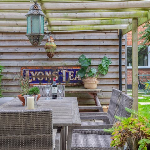 Sip sundowners in the comfortable outdoor dining area