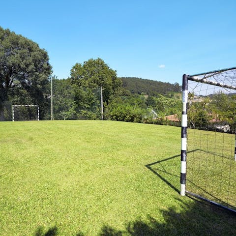Join the kids on the grass for an afternoon game of volleyball, badminton, or football