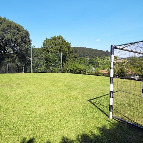 Join the kids on the grass for an afternoon game of volleyball, badminton, or football