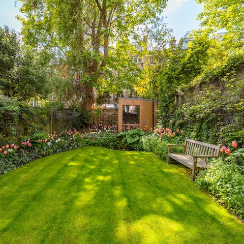 Relax in the serene setting of the back garden