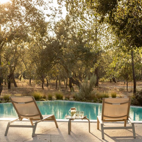 Find peace and relaxation while lounging by the pool
