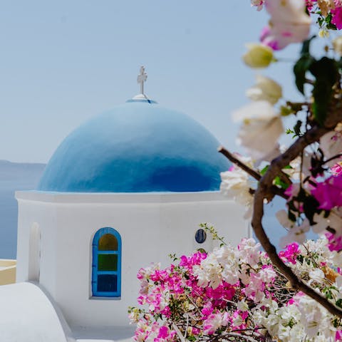 Explore the village of Megalochori with its beautiful churches and Venetian bell towers