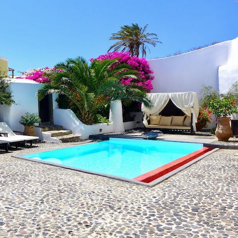 While away sunny afternoons taking dips in the private flower-framed pool