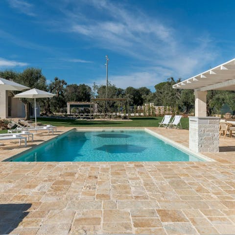 Spend blissful afternoons relaxing by the private pool