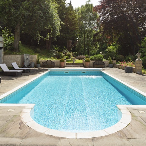 Dive into the the outdoor pool to cool down in the summer months