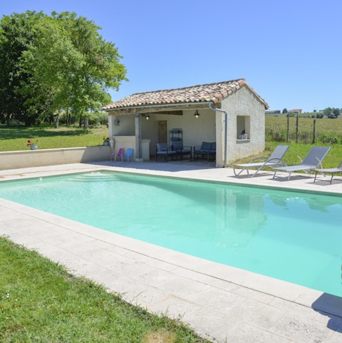 Dive into your private heated pool and swim a few laps