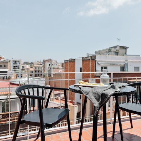 Share a glass of sangria on the sunny balcony