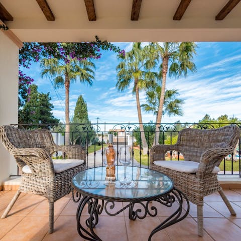 Enjoy a sunset tipple on the balcony
