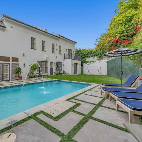 Float under the sun in the large private pool