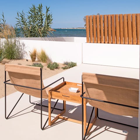 Sip a Prosecco in the private garden, overlooking the sea