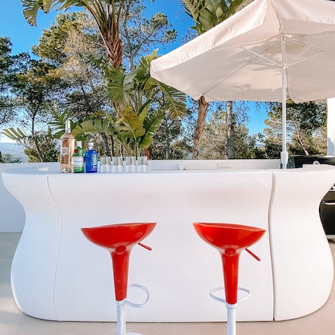 Keep the drinks flowing at the private poolside bar