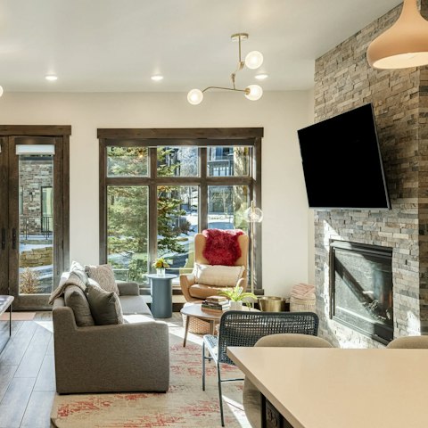 Curl up with morning coffees in the light-filled living room