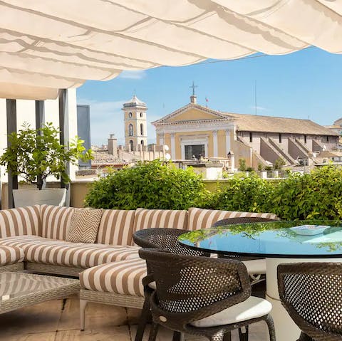 Enjoy views across the city from your incredible rooftop terrace