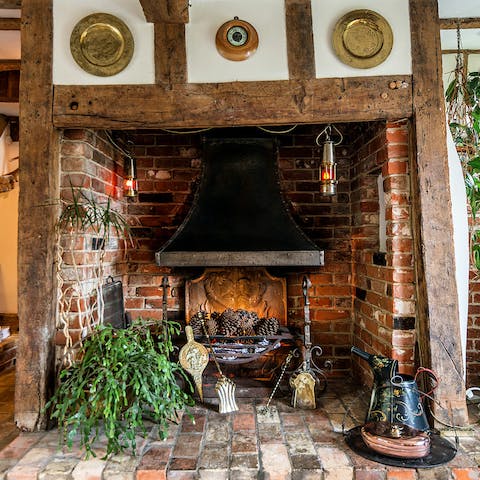 Cosy up around fireplace after a long country walk