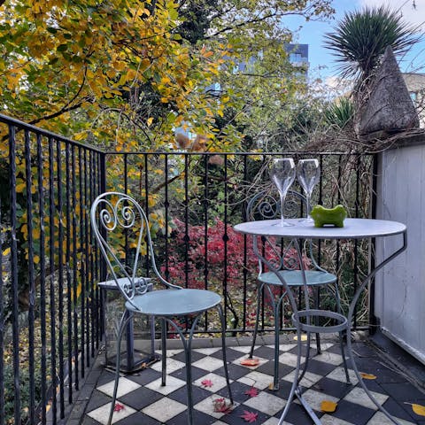 Enjoy a glass of wine on the balcony