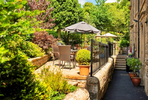 Step outside onto the terrace so (hopefully) soak up some of that elusive British sunshine