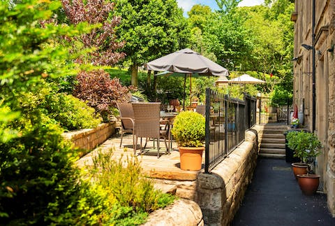 Step outside onto the terrace so (hopefully) soak up some of that elusive British sunshine