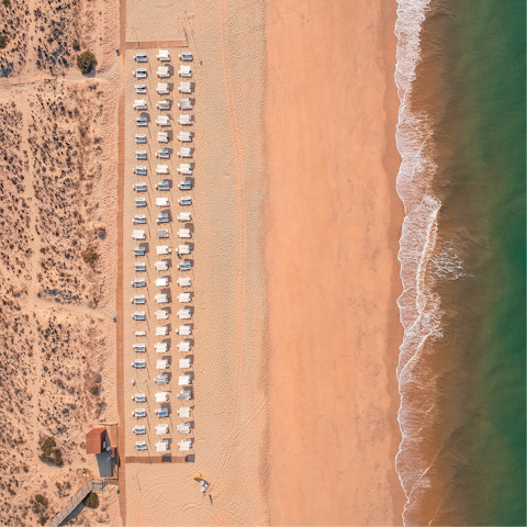 Take a casual walk down to Praia do Paraíso