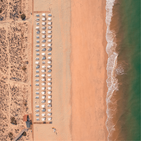 Take a casual walk down to Praia do Paraíso