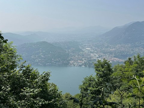 Hike scenic forested hills rising above Lake Como, right on your doorstep