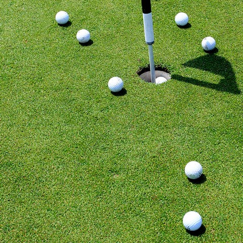 Tee off at the championship layout Corfu Golf Course, 17km from the resort