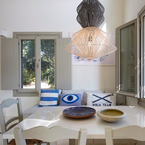Enjoy a spot of breakfast in the bright and beach-inspired living space