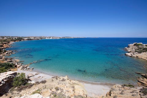 Bask in the warm sunshine on Damuli Beach, a two-minute stroll from your home