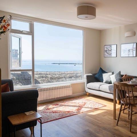 Kick back in the living room with sea views