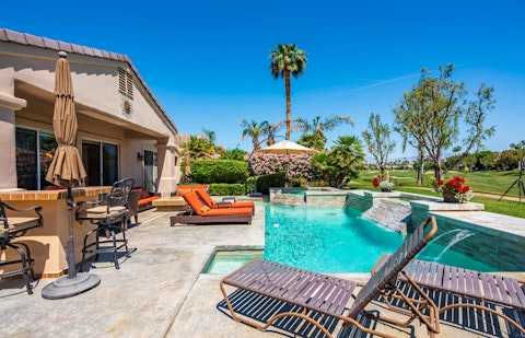 Look forward to leisurely days spent enjoying the lounger-lined pool