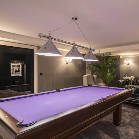 Show off your pool skills in the downstairs lounge