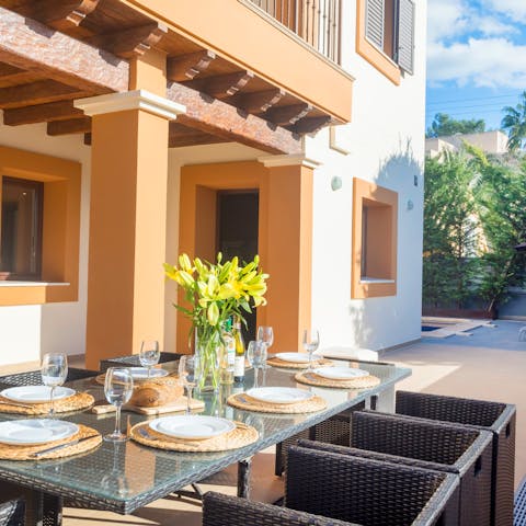 Dine alfresco with loved ones on the sun-drenched terrace