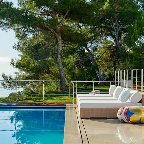 Enjoy total relaxation while lounging by the pool