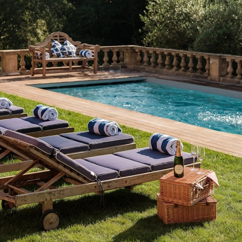 Spend serene days stretched out by the heated pool