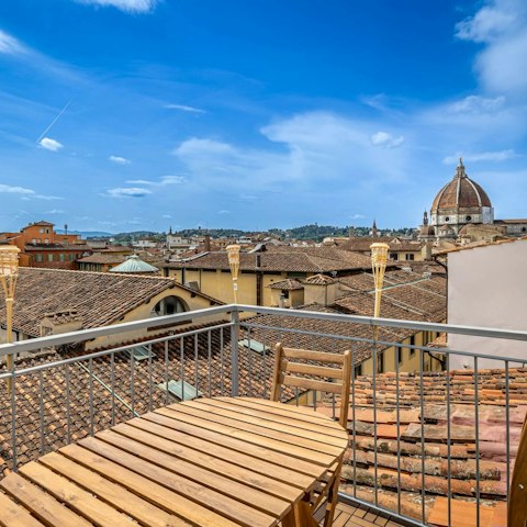 Sit above Florence's rooftops with the Duomo in full view