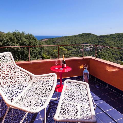 Watch the sun go down with a cocktail on the balcony