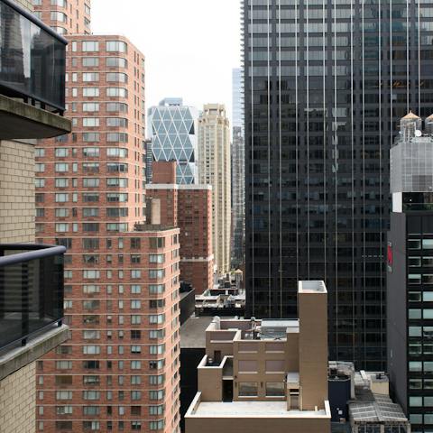 Take in dramatic skyscraper views from the your private balcony