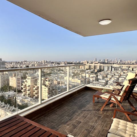 Stretch out on the balcony loungers for stellar views across the city