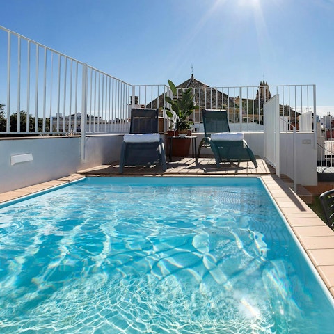 Cool off from the Seville sun in the private pool