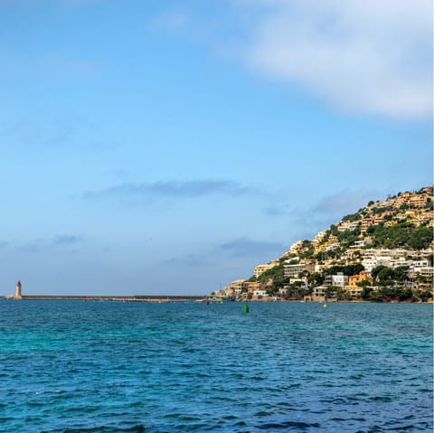 Explore the beautiful harbour town of Port d’Andratx with its stunning mountain backdrop