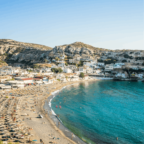 Visit the bohemian village of Matala, a short drive away