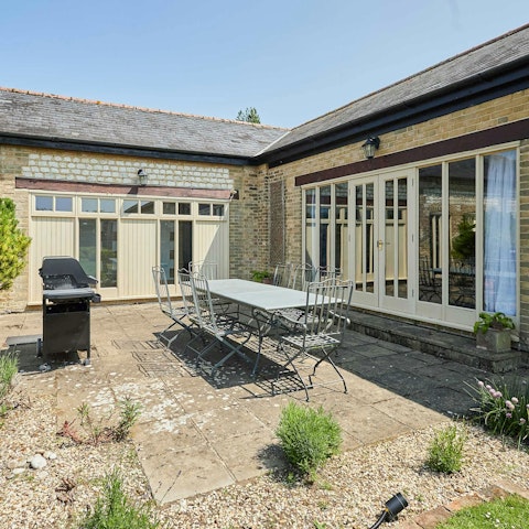 Have a glass of English sparkling wine in the sunny garden