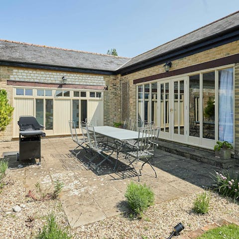 Have a glass of English sparkling wine in the sunny garden