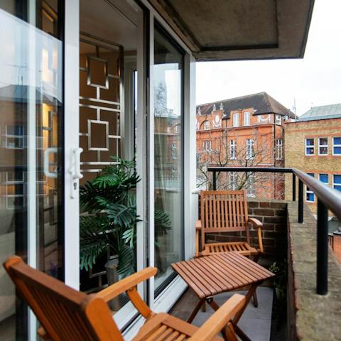 Enjoy a glass of Champagne on your private balcony