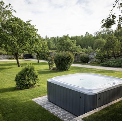 Soak in the outdoor hot tub