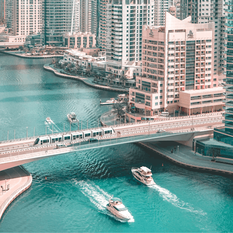 Discover Dubai Marina's five-star eateries, high-end boutiques and lively atmosphere