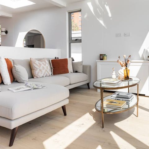 Unwind in the cosy, light-filled living area