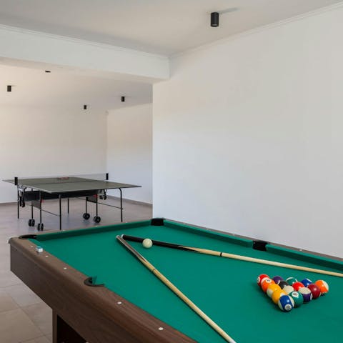 Enjoy rounds of pool and table tennis in the games room